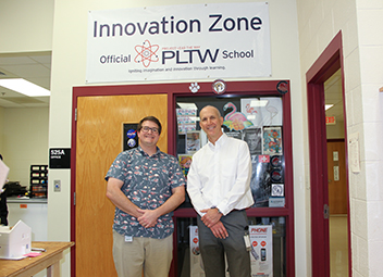  Jon Hidalgo (L) and David Humphries (L) earn Outstanding Teacher Award from Project Lead The Way